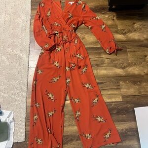 Francesca's Collections Red Floral Jumpsuit with Wide-Leg Design